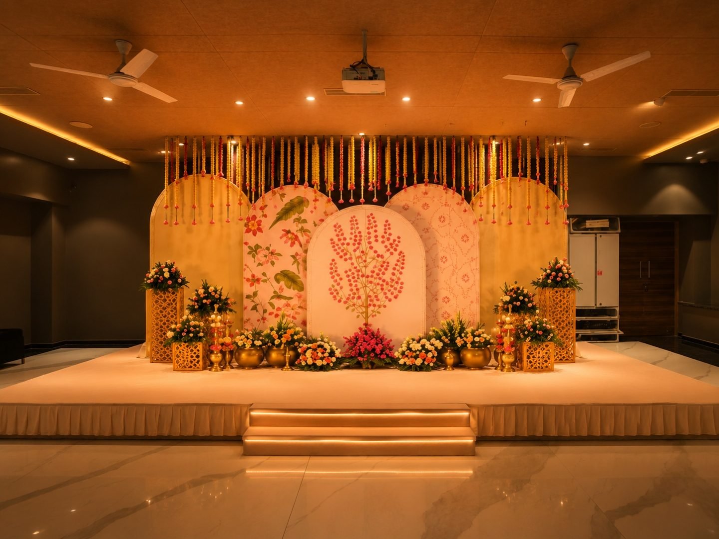Gold and cream indoor stage dressed with florals